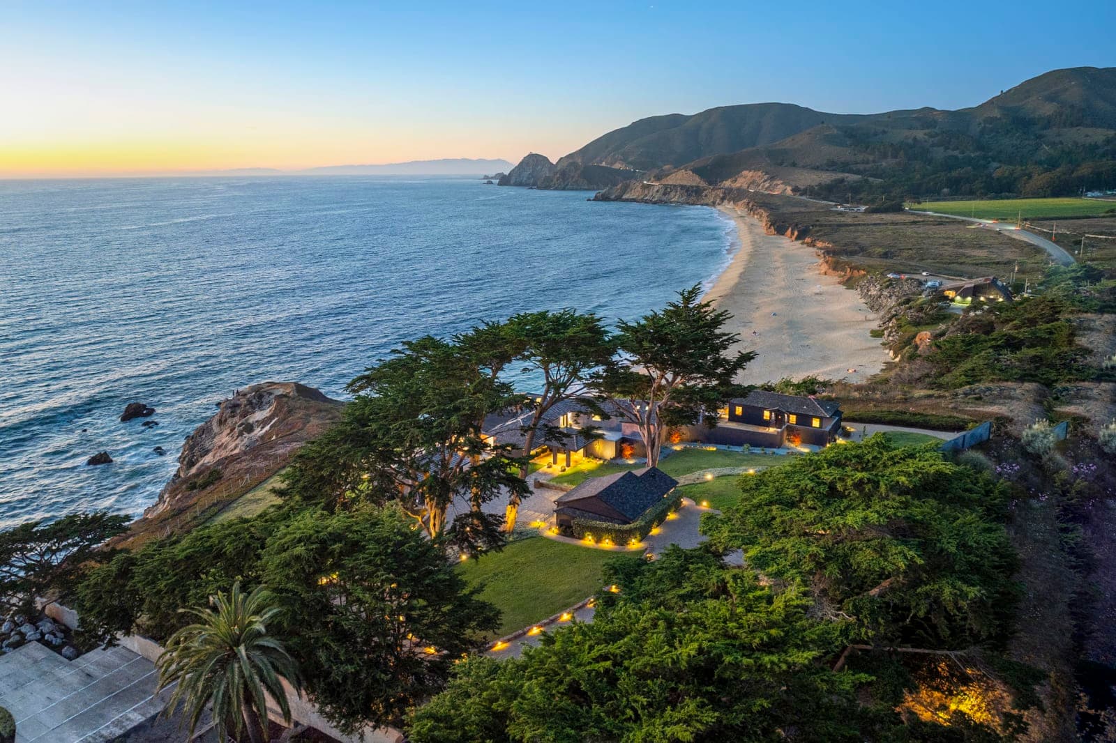 Distinguished Oceanfront Point Estate with Iconic Beach + Mountain Vistas